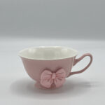 charming tea cup and saucer set